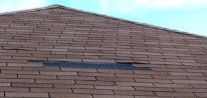 Shingles are missing in roof at Aurora ON Shingles are missing in roof at Aurora ON